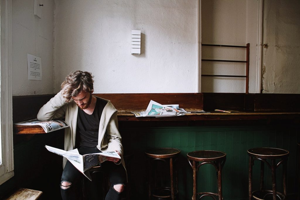 man-reading-newspaper