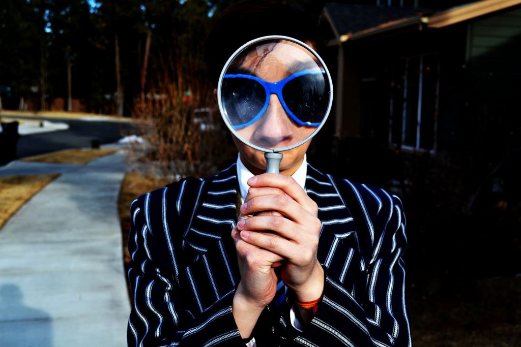 man-with-magnifying-glass