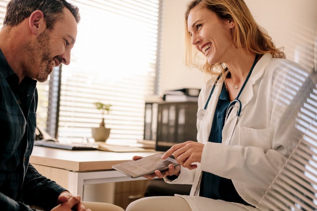 man-woman-doctor-chatting