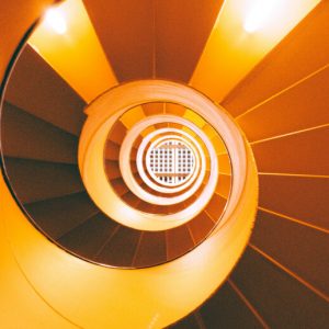 A spiral of orange stairs